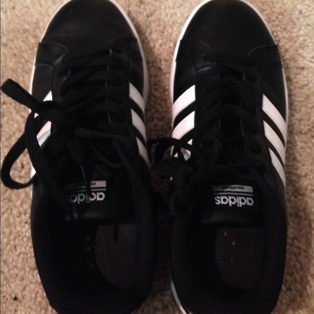 Black and white striped Adidas, female size 7